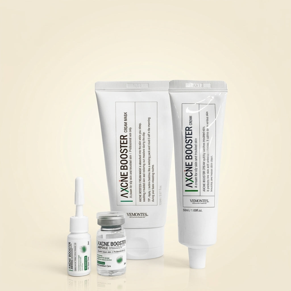 VEMENTES Axne Boosters skincare set including a cream mask tube, a serum tube, a small dropper bottle, and a vial, arranged on a light beige background.